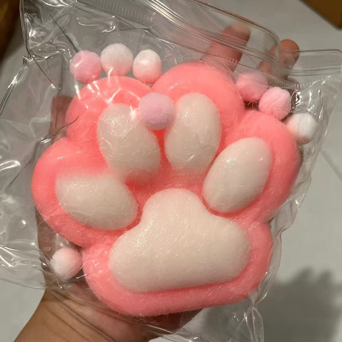 Squishy sensorial de patita de gato transparente | GATOKOOL