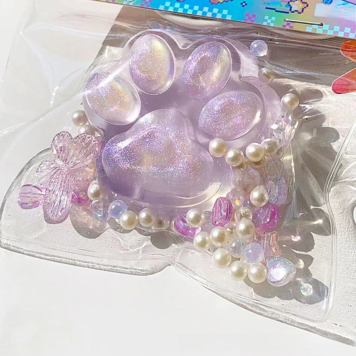 Squishy sensorial de patita de gato transparente | GATOKOOL