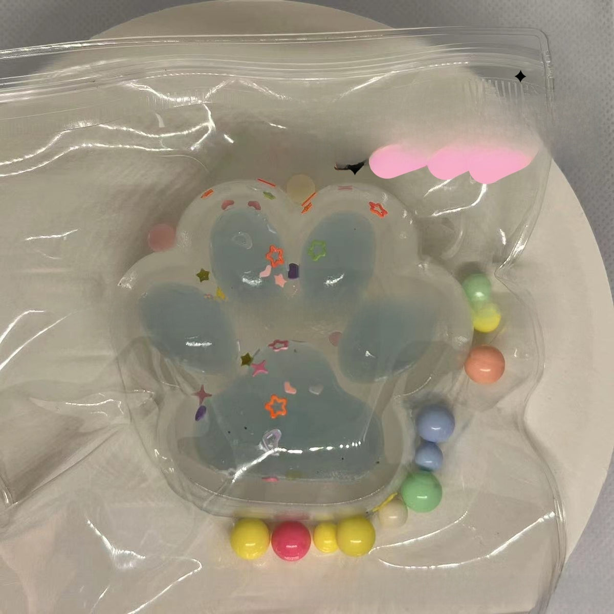 Squishy sensorial de patita de gato transparente | GATOKOOL