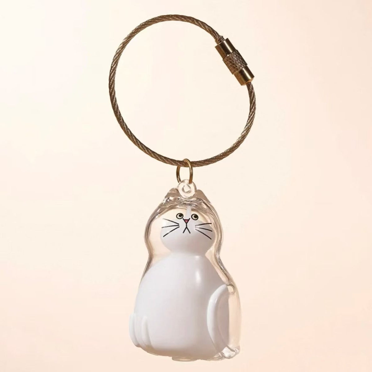 Llavero cápsula para guardar pelo de tu gato | GATOKOOL